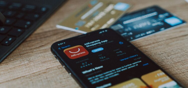 Is Your Online Shopping App Invading Your Privacy? black and orange card on brown wooden table
