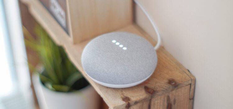 How to Keep Your Smart Home from Turning Against You Free Round Grey Speaker On Brown Board Stock Photo