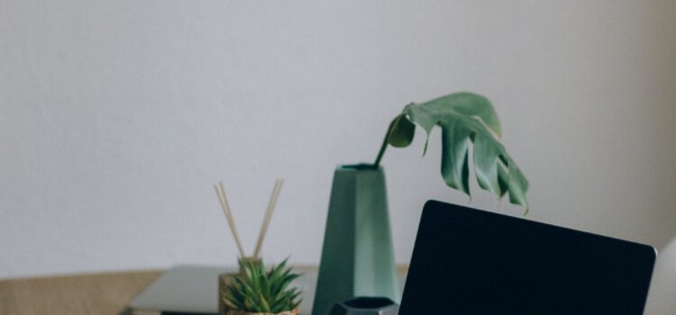 How Small Businesses Can Approach Workforce Technology Modernization Free Black Laptop Computer On Brown Wooden Table Stock Photo