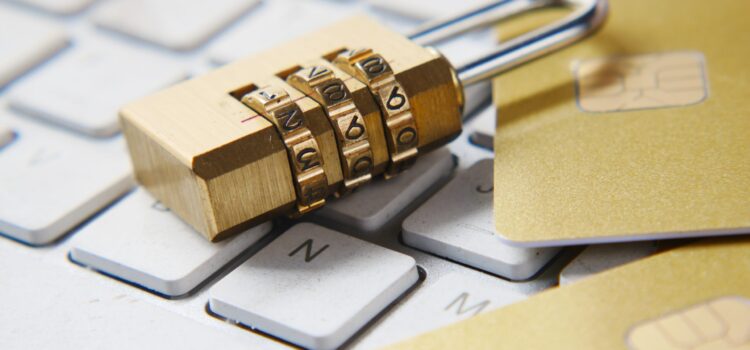 Need to Show the Tangible Value of Cybersecurity? Here’s How a golden padlock sitting on top of a keyboard