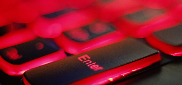 a close up of a red and black keyboard