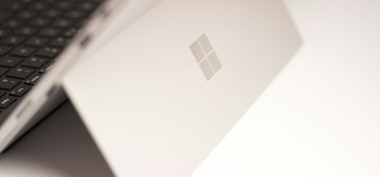 white-laptop-computer-on-white-table