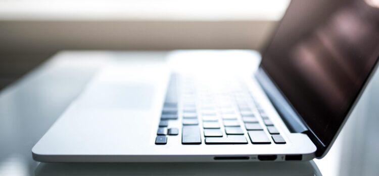 shallow-focus-photography-of-macbook