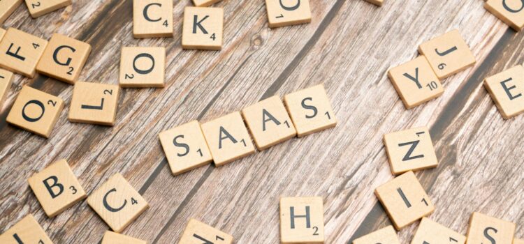 scrabble-letters-spelling-saas-on-a-wooden-tabl