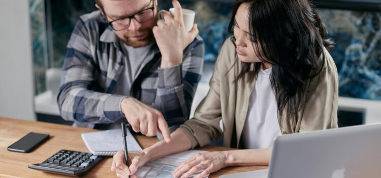 Free couple calculating al their bills stock photo